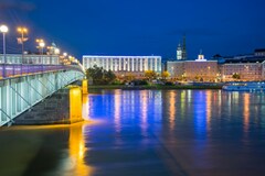 photo of the Linzer Nibelungenbrücke, by Alain Bonnardeaux on Unsplash - https://unsplash.com/photos/white-bridge-over-river-during-night-time-S_KH3f2JB2k